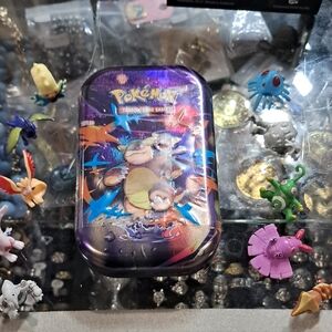Pokemon Tin with Vibrant Characters in Purple and Blue